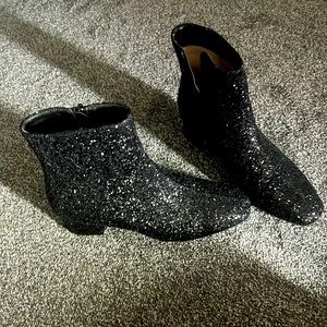Black sparkling boots.
